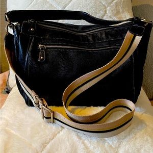 Black leather Furla crossbody bag.
